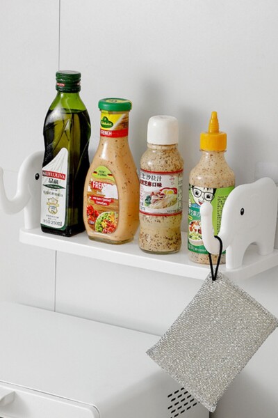 hayret sepeti Küçük Alanlar İçin Büyük Çözüm: Yapışkanlı Raf Sistemi