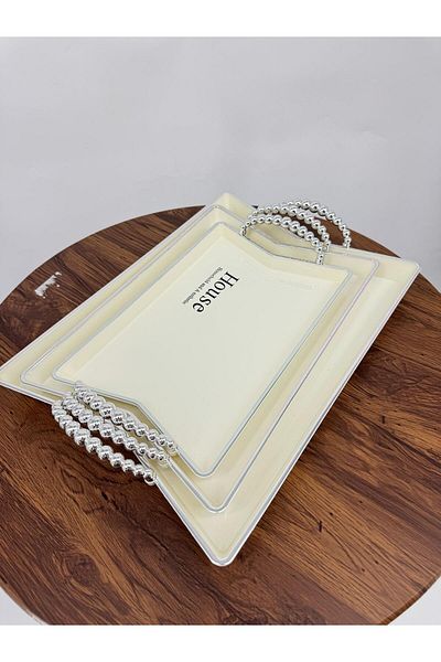 Living A set of two-piece oval serving trays with a sophisticated wavy design, sugar/silver