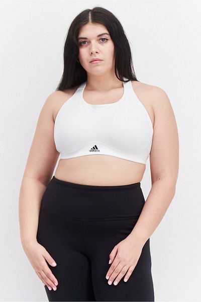 adidas حمالة صدر رياضية مبطنة بشعار العلامة التجارية للنساء، باللون الأبيض