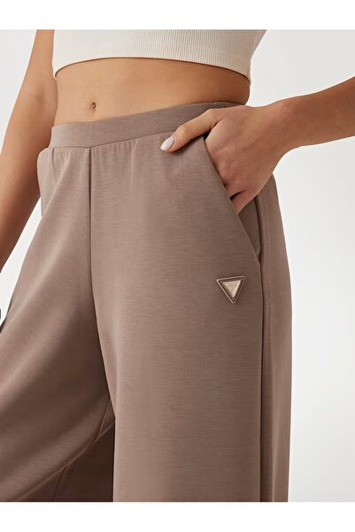 Guess Jeans Dámské hnědé tepláky s širokými nohavicemi Guess jeans