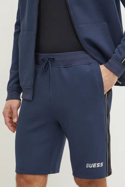 Guess Jeans Pánské modré kraťasy s postranním logem Guess jeans