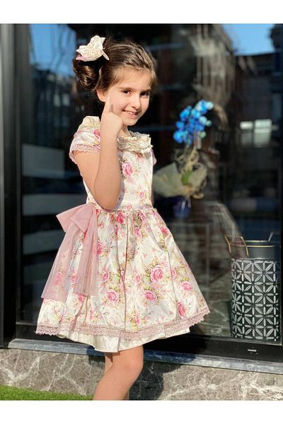 HC Kids Wear فستان كريمي مزين بالزهور على الطراز الطليعي للفتيات + مشبك