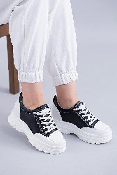 Guja حذاء رياضي نسائي بكعب عريض من الجلد الأسود الأصلي من LORENE