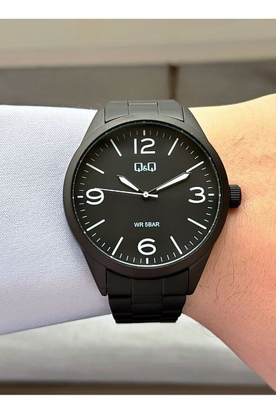 Q&Q Men's Black Metallic Striped Cord Wrist Watch