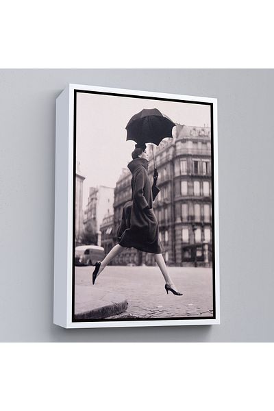 Harita Sepeti Carmen Jumping over a Puddle of Water on the Street with Umbrella in Black Frame Canvas Print