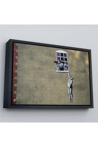 Harita Sepeti Crni uokviren Banksy, Žena koju je muž naslikao na platnu