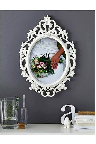 IKEA Large oval frame decorated in ivory white from the UNG DRILL 14743 series from the IKEA collection