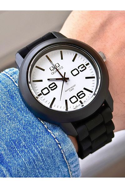 Q&Q Women's Waterproof Plastic Cord Wristwatch