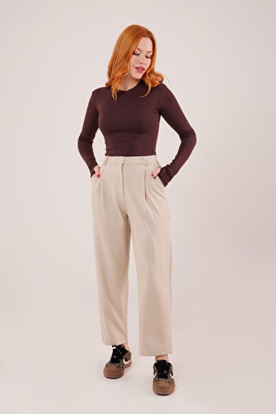 Butik بنطلون كريمي بتفاصيل جيب من إيدوليكا كاباما