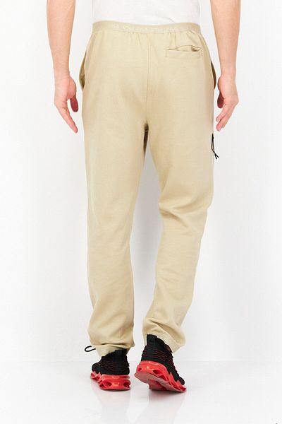 Fila Men Sportswear Fit Pull-on Trassem Outdoor Track Pants, Beige