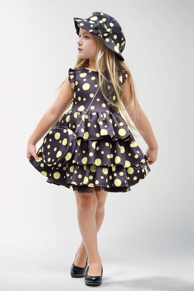 Riccotarz Girl's Sleeves and Skirt Layered Ruffled Dress with Yellow Spots