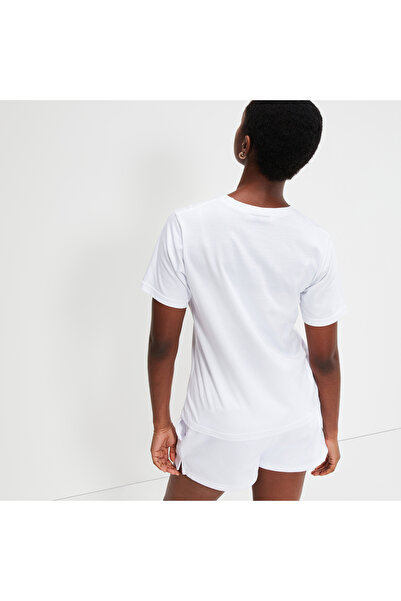 Ellesse Stylový design s detailem ohně