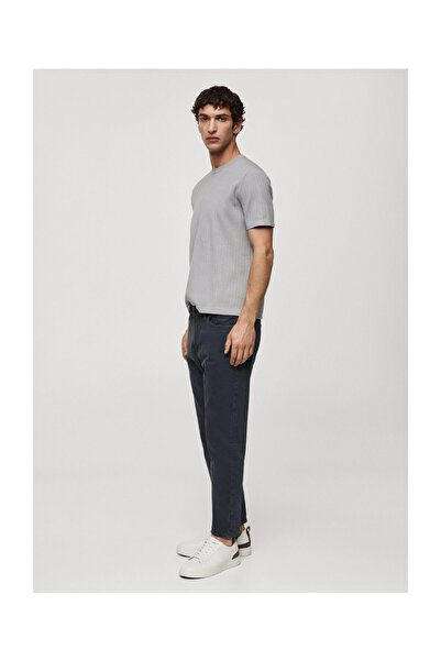 MANGO Man Je mi príťažlivé nosiť tapered-fit džínsy