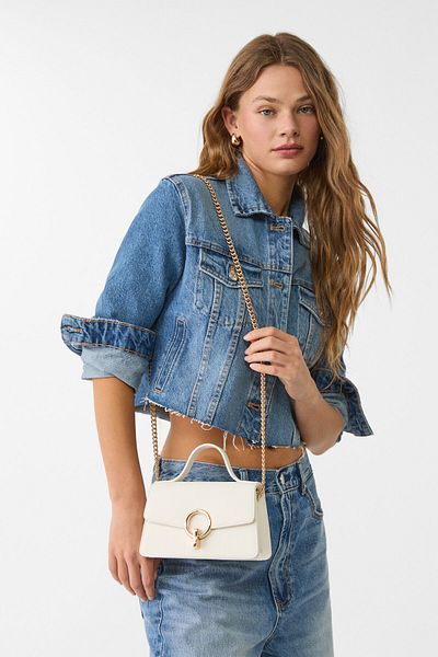 Stradivarius Crossbody bag with a round clasp