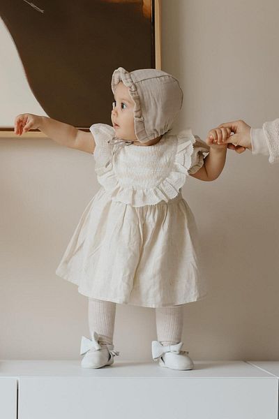 Le Mabelle Beige Short Sleeve Girls Dress with Scallop Detail and Bow - Rosa