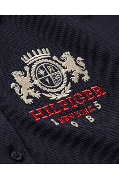 Tommy Hilfiger تي شيرت بولو تومي هيلفيغر للنساء باللون الأزرق