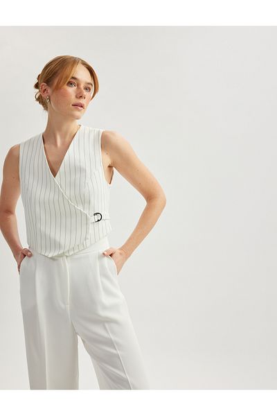 Koton Asymmetric V-neck striped blazer vest.