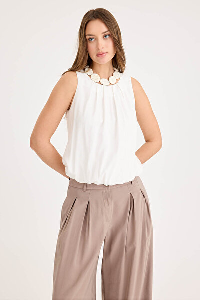 Vitrin Pleated Front Zero Sleeve Skirt Hem Elastic Blouse