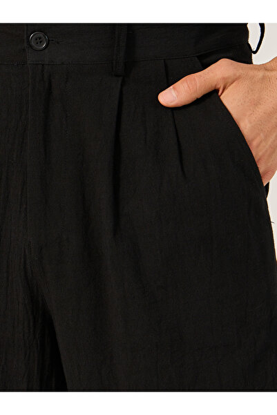 Styli Textured Relaxed Fit Pleated Trousers