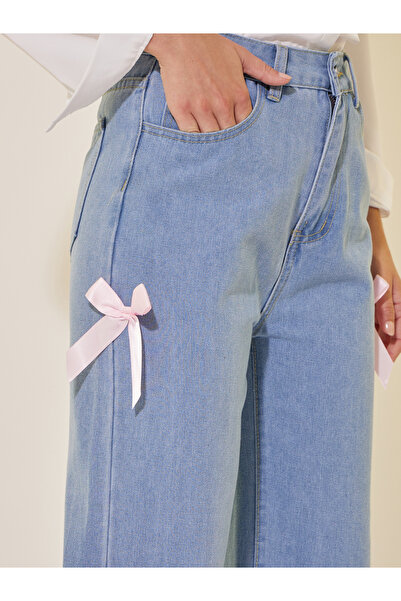 Take Two By Styli Mid Rise Wide Leg Faded Jeans with Bow Detail