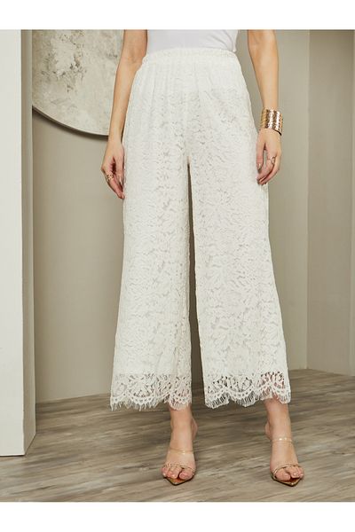 Styli Mid Rise Wide Leg Lace Pants