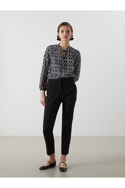 LC Waikiki Pantaloni tăiați morcovi cu talie elastică