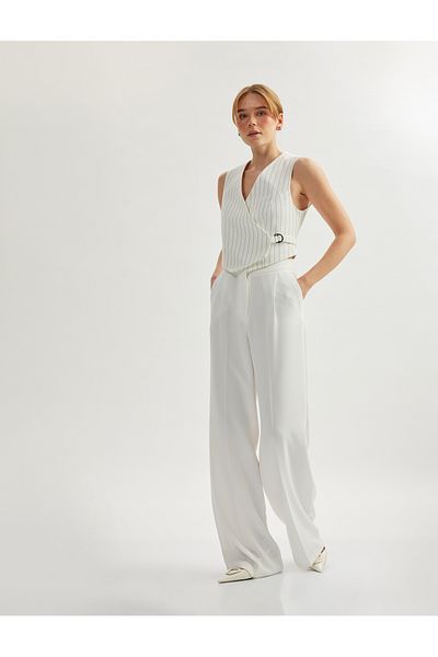 Koton Asymmetric V-neck striped blazer vest.
