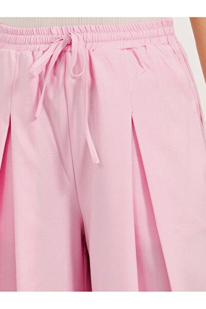 Styli Solid Inverted Pleated Wide Leg Pants
