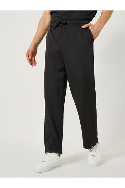 Styli Solid Loose Fit Mid Rise Pants with Drawstring