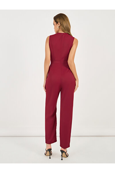 Styli Solid V Neck Sleeveless Jumpsuit with Metal Buckle Detail