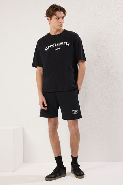 Trendyol Collection Чорний спортивний комплект з 2 частин: шорти та футболка великого розміру з 100% бавовни