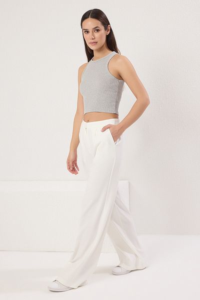 Trendyol Collection Білі широкі штани з заниженою талією з еластичною спинкою TWOSS25PL00021