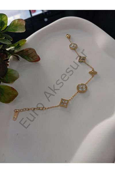 stainless steell سوار من الفولاذ مع تفاصيل البرسيم الذهبي