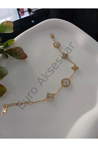 stainless steell سوار من الفولاذ مع تفاصيل البرسيم الذهبي