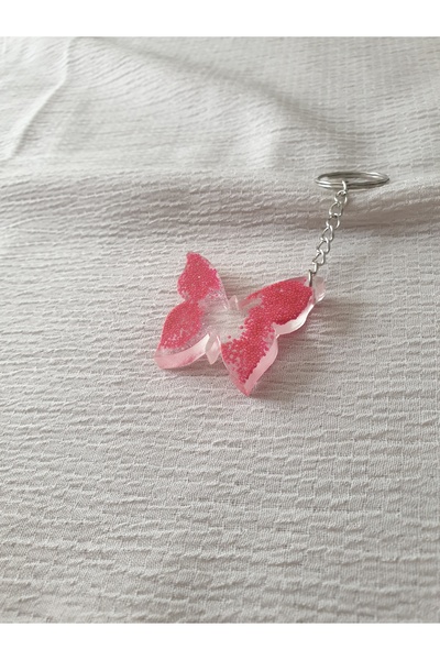 LuArte سلسلة مفاتيح على شكل فراشة إيبوكسي باللون الوردي