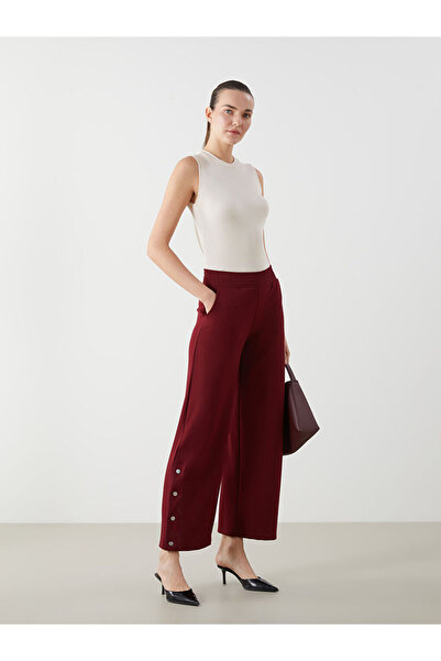 LC Waikiki بنطلون نسائي ذو ساق واسعة وخصر مطاطي باللون الأحمر الداكن