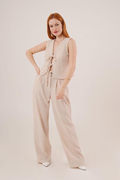 LOKADI طقم سترة وبنطلون بتفاصيل ربط أمامي للنساء