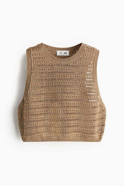 H&M بلوزة لامعة بمظهر الكروشيه