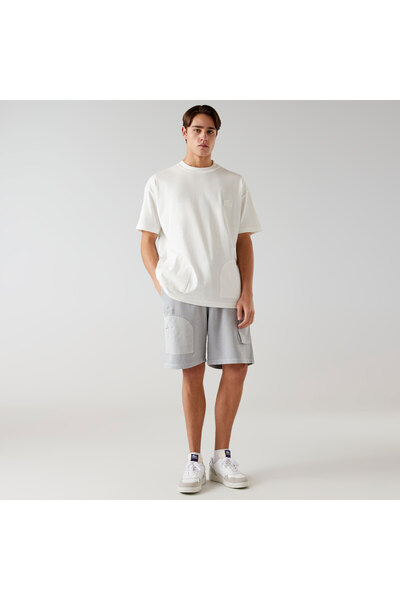 Lacoste شورت رجالي باللون الرمادي من X House Of Superstep