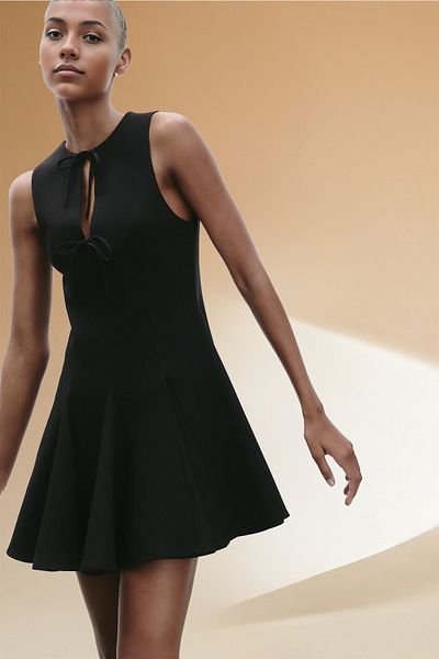 Lia Blanco's Women's Flared Eteli Bow Short Dress