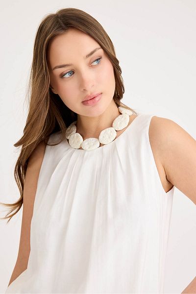 Vitrin Pleated Front Zero Sleeve Skirt Hem Elastic Blouse
