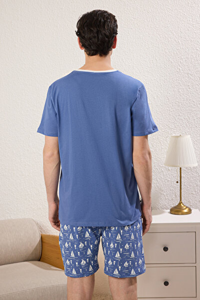 Trendyol Collection Set pijama cu pantaloni scurți tricotați cu imprimeu albastru slim fit TMNSS25PT00031