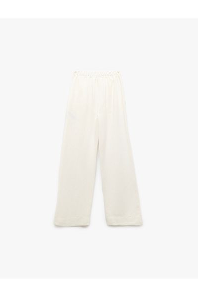 Koton Hose mit weitem Bein aus Viskose-Mischgewebe mit Knopfdetail und Taschen