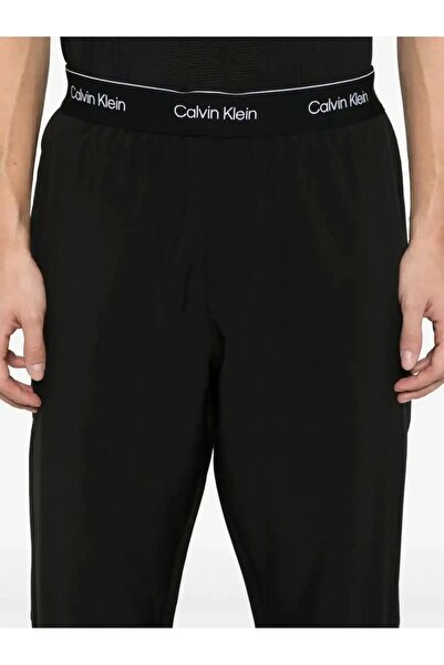 Calvin Klein WO - WOVEN PANT Férfi melegítőnadrág LVGMS5P643-UB1