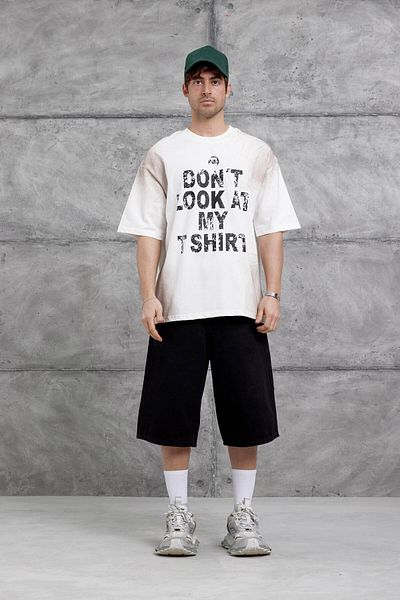 NOMARC Λευκή T-shirt Oversize με γραφή "Don't Look At My Tshirt"