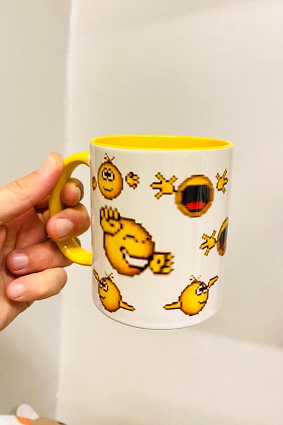 Namgo كوب بورسلين أصفر راقص على شكل رموز تعبيرية