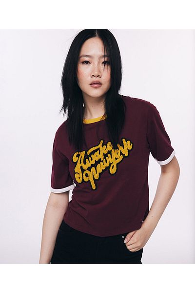 Twist Punch Applique T-Shirt - Stylish and Comfortable Design