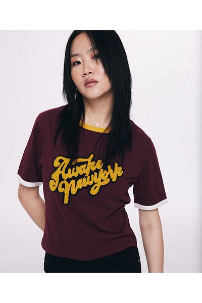 Twist Punch Applique T-Shirt - Stylish and Comfortable Design