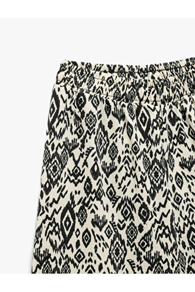 Koton Beli Lastikli Desenli Bol Paça Pantolon