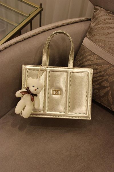 Mimoza Women's Gold Color Small Shiny Faux Leather Women's Hand/Shoulder Bag with Embroidery Detail Plush Charm Gift